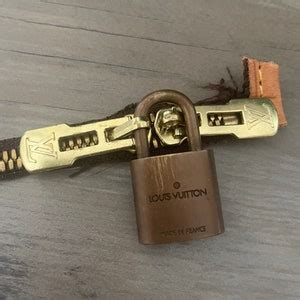 lv zipper puller|authentic louis vuitton lock key.